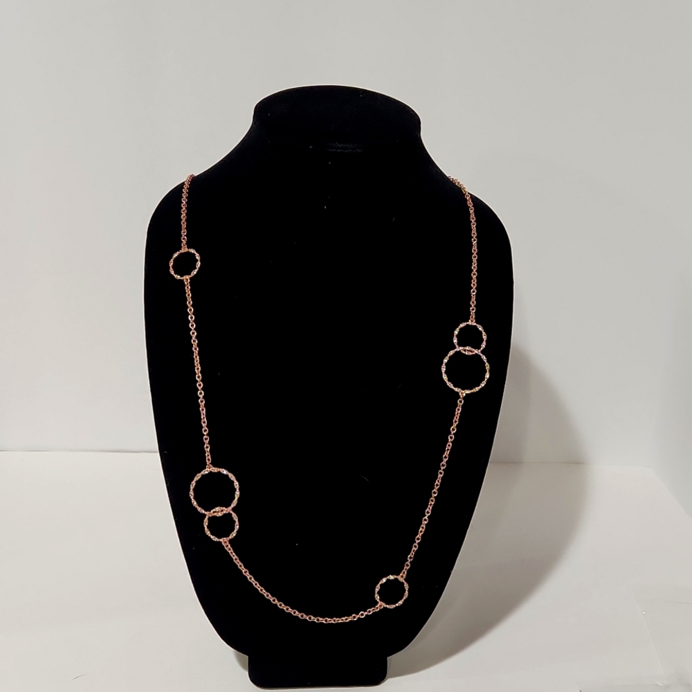 Lane Bryant rose gold tone with a 26. 5 inch drop